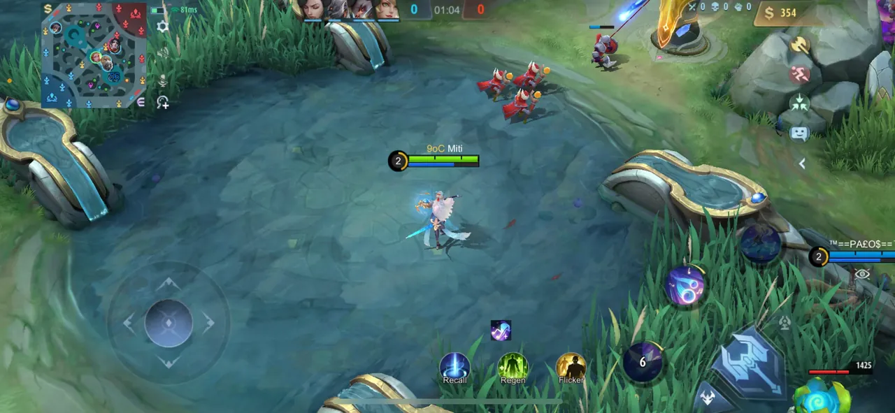 Tampilan pertandingan MLBB dengan minimap di sudut kiri atas untuk memantau posisi hero dan lane.